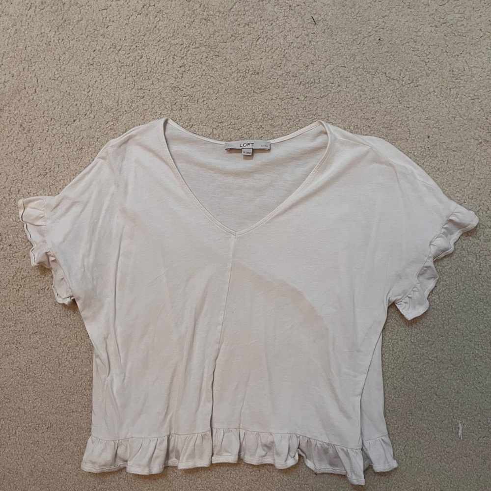 White t-shirt with ruffles on sleeves and waist
